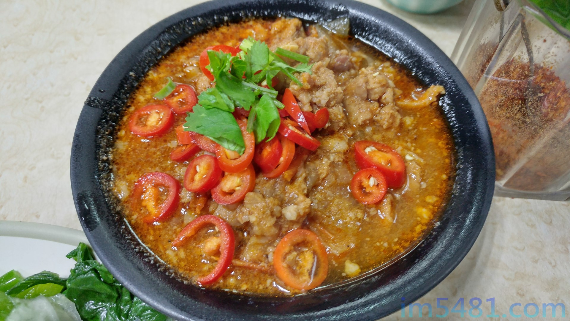 雲南傣族小吃店的招牌飯打拋豬